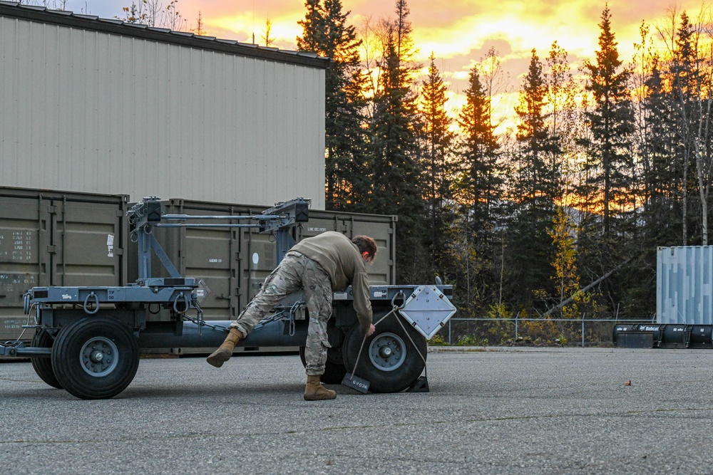 The 3rd MUNS perform a munitions loading exercise on JBER