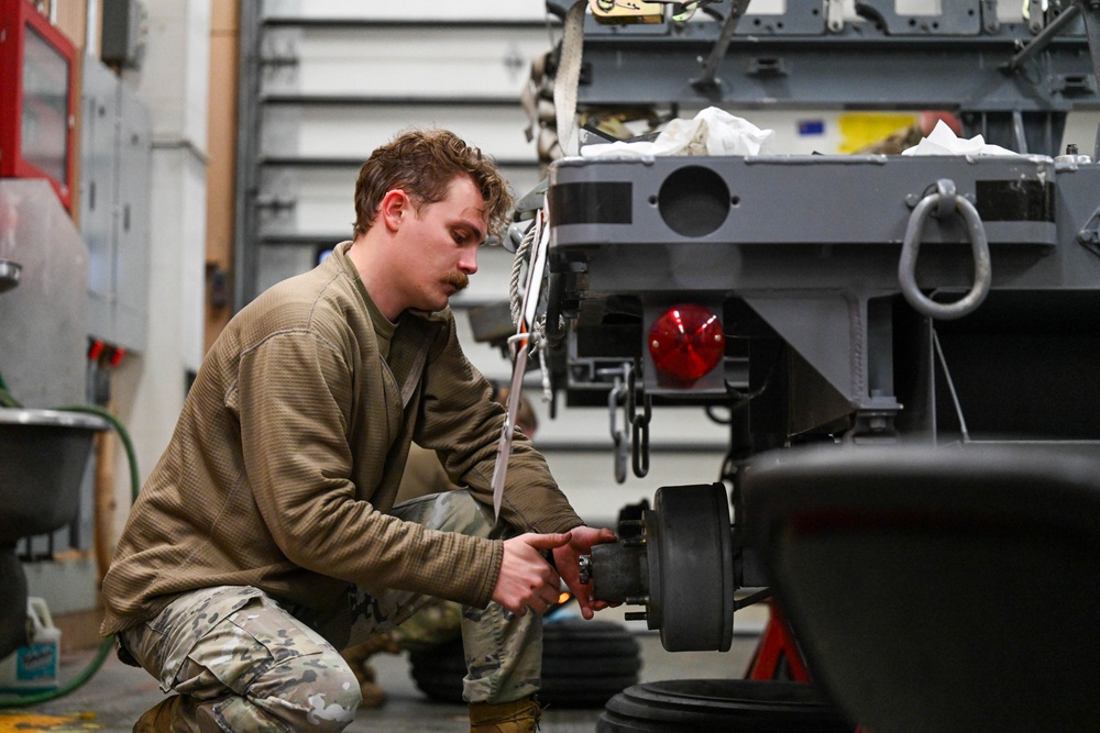 The 3rd MUNS perform a munitions loading exercise on JBER