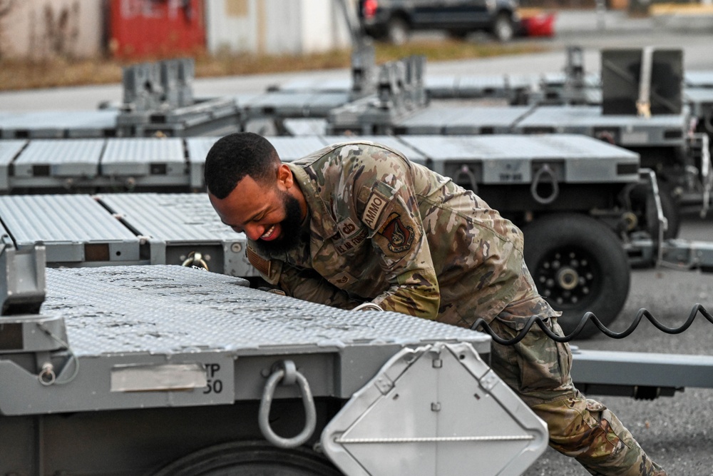 The 3rd MUNS perform a munitions loading exercise on JBER