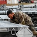 The 3rd MUNS perform a munitions loading exercise on JBER