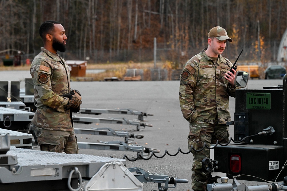 The 3rd MUNS perform a munitions loading exercise on JBER