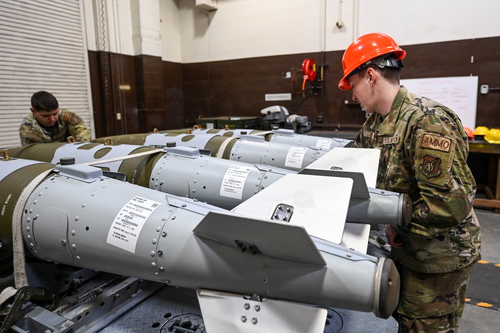 The 3rd MUNS perform a munitions loading exercise on JBER