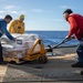 USS Spruance conducts a vertical replenishment with the USNS Caesar Chavez