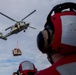 USS Spruance conducts a vertical replenishment with the USNS Caesar Chavez
