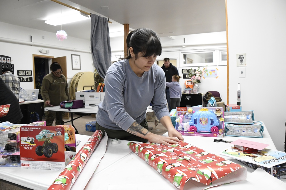 168th Wing Airmen Wrap Presents for Operation Santa Claus