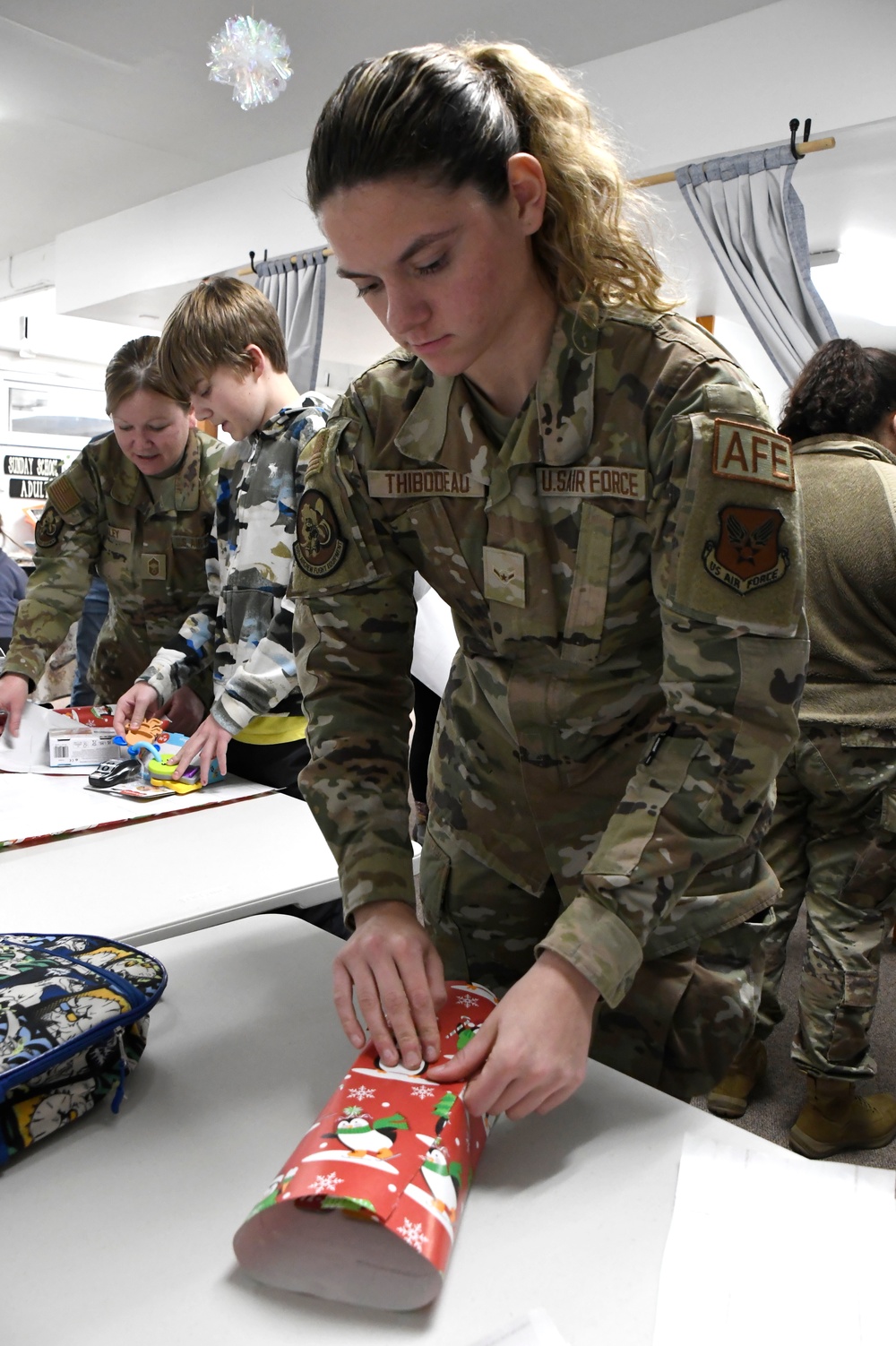 168th Wing Airmen Wrap Presents for Operation Santa Claus