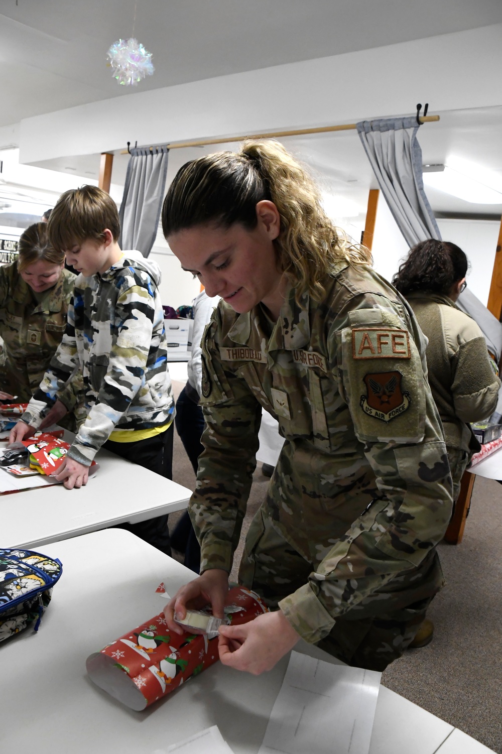 168th Wing Airmen Wrap Presents for Operation Santa Claus