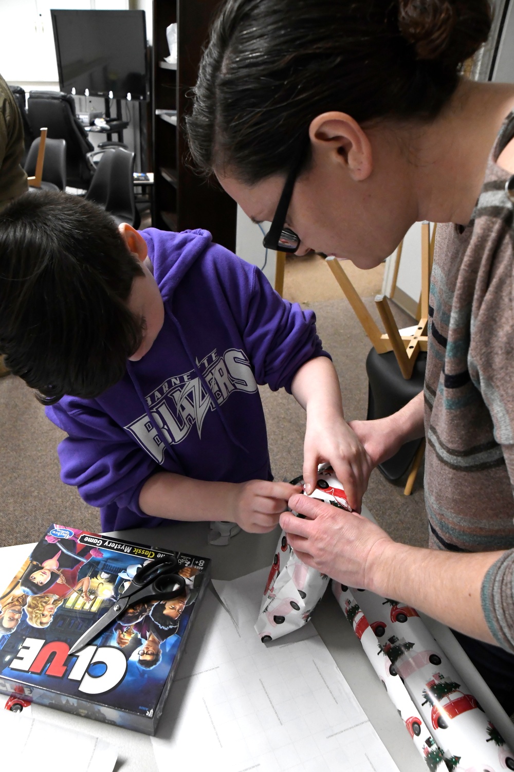 168th Wing Airmen Wrap Presents for Operation Santa Claus