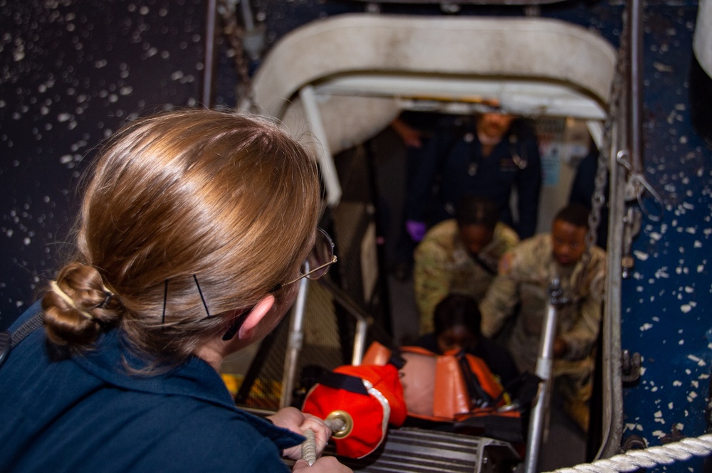 U.S. Army Soldiers assist with TCCC Training aboard USS Ronald Reagan (CVN76)