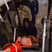 U.S. Army Soldiers assist with TCCC Training aboard USS Ronald Reagan (CVN76)