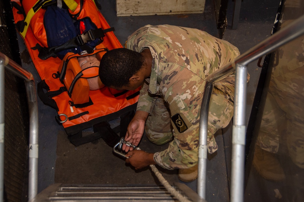 U.S. Army Soldiers assist with TCCC Training aboard USS Ronald Reagan (CVN76)