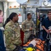 U.S. Army Soldiers assist with TCCC Training aboard USS Ronald Reagan (CVN76)