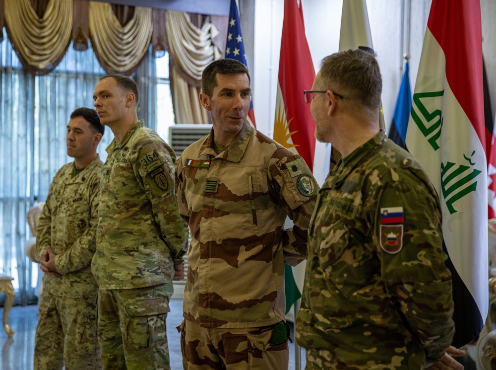 Coalition Forces Members Receive Coins