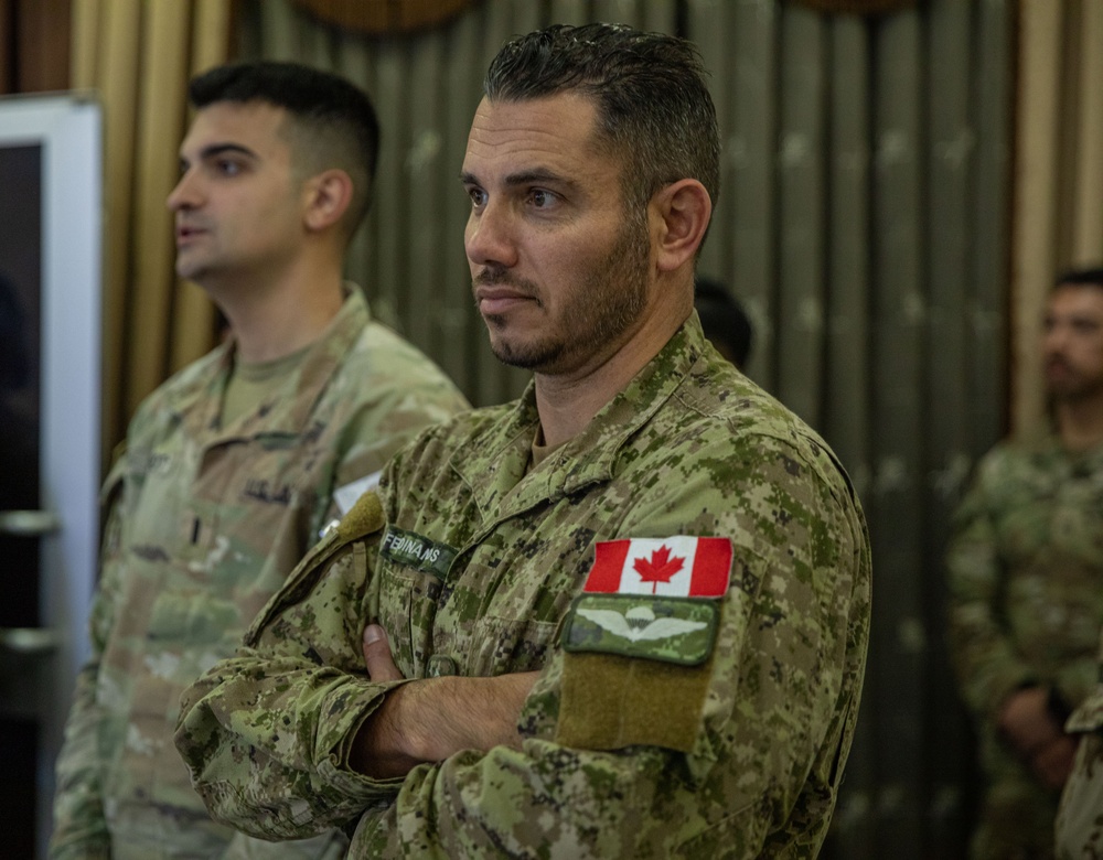 Coalition Forces Members Receive Coins