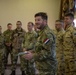 Coalition Forces Members Receive Coins