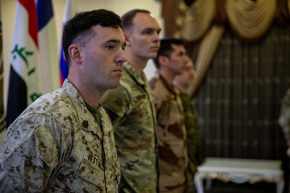 Coalition Forces Members Receive Coins