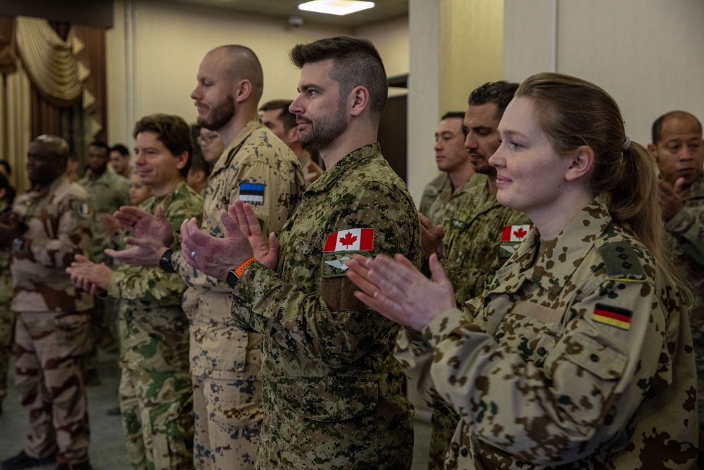 Coalition Forces Members Receive Coins