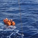 Coast Guard, tanker ship Orange Ocean rescue boater from vessel on fire sinking 420 miles north of Puerto Rico