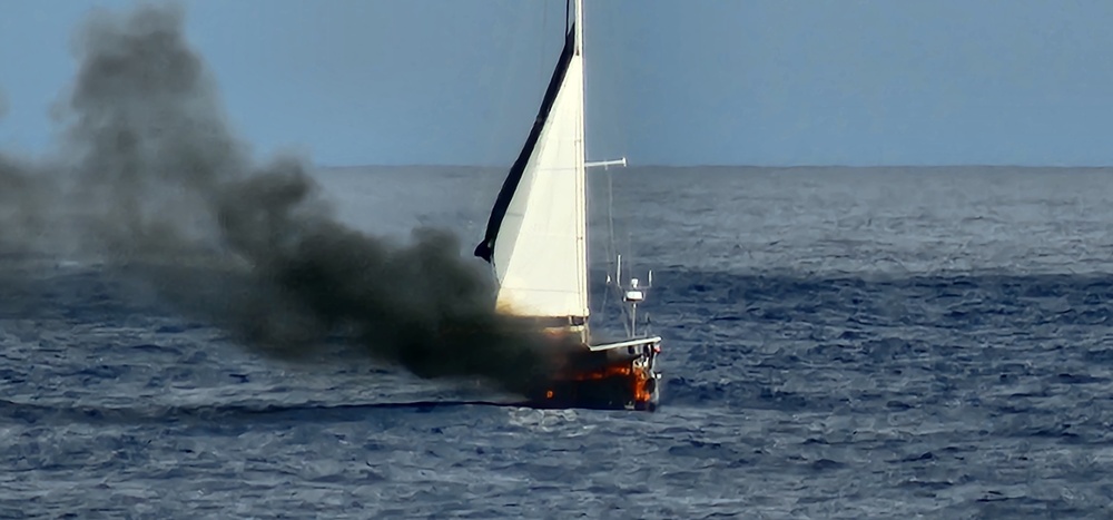 Coast Guard, tanker ship Orange Ocean rescue boater from vessel on fire sinking 420 miles north of Puerto Rico