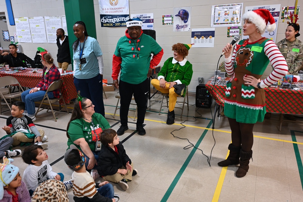 187th Medical Battalion spreads holiday cheer at Briscoe Elementary