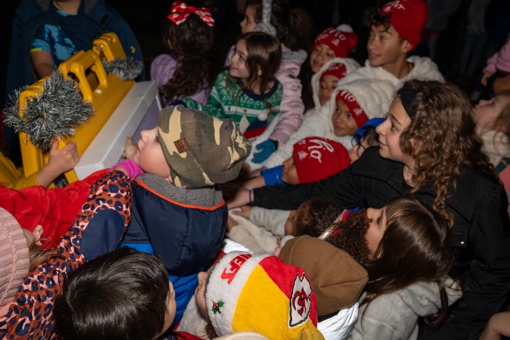 Jingle Bells, Twinkling Lights, Holiday Smiles: Team McChord lights the tree!