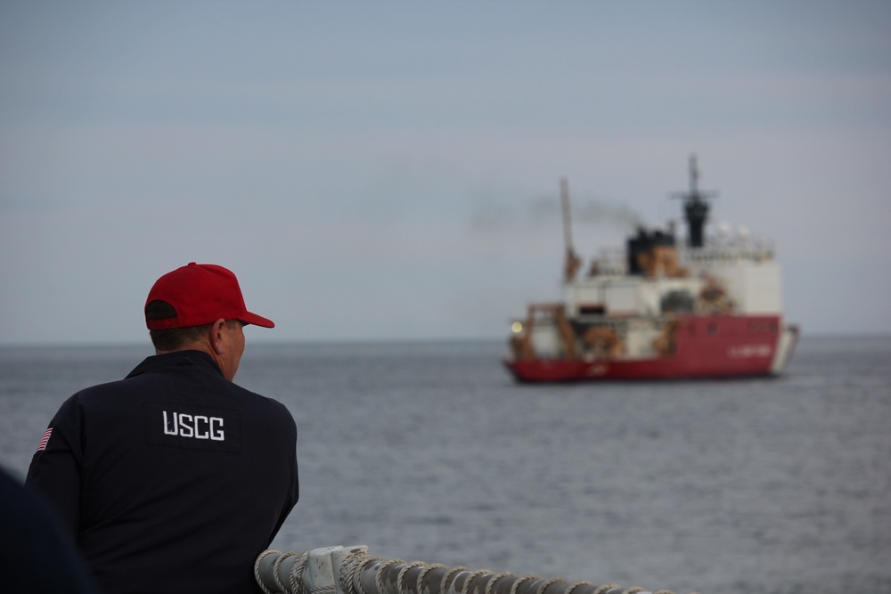 Coast Guard Cutters Bertholf and Healy conduct joint operations near Unimak Pass, Alaska
