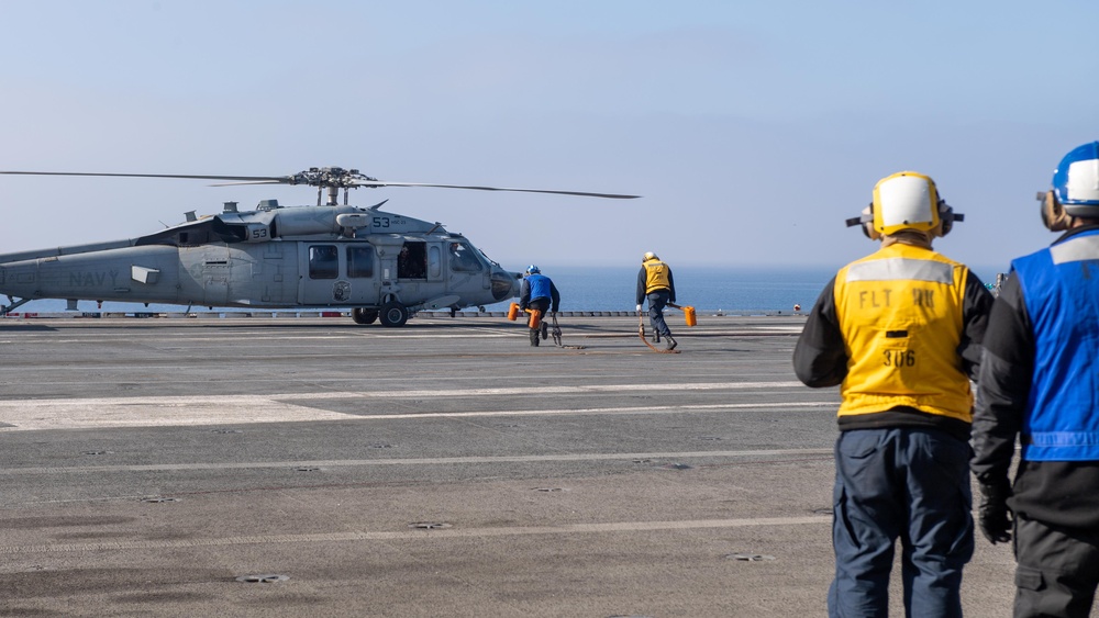 USS Ronald Reagan (CVN76) Sailors conduct flight deck operations