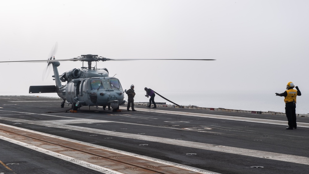 USS Ronald Reagan (CVN76) Sailors conduct flight deck operations