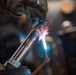 USS Ronald Reagan (CVN 76) Sailors practice welding