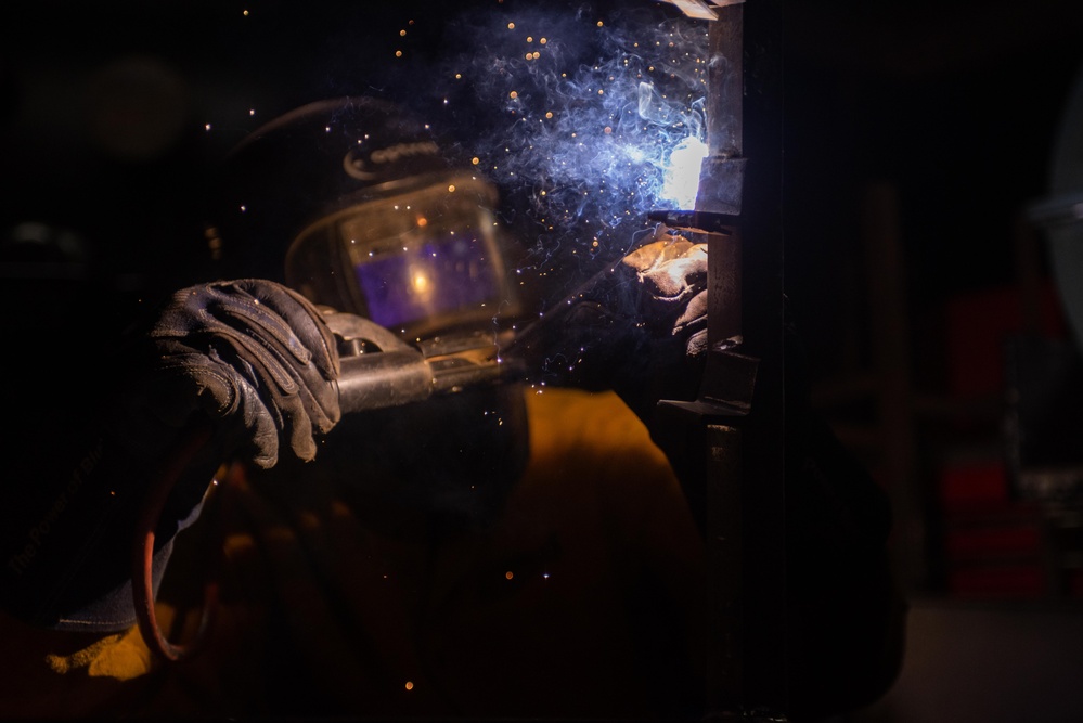 USS Ronald Reagan (CVN 76) Sailors practice welding