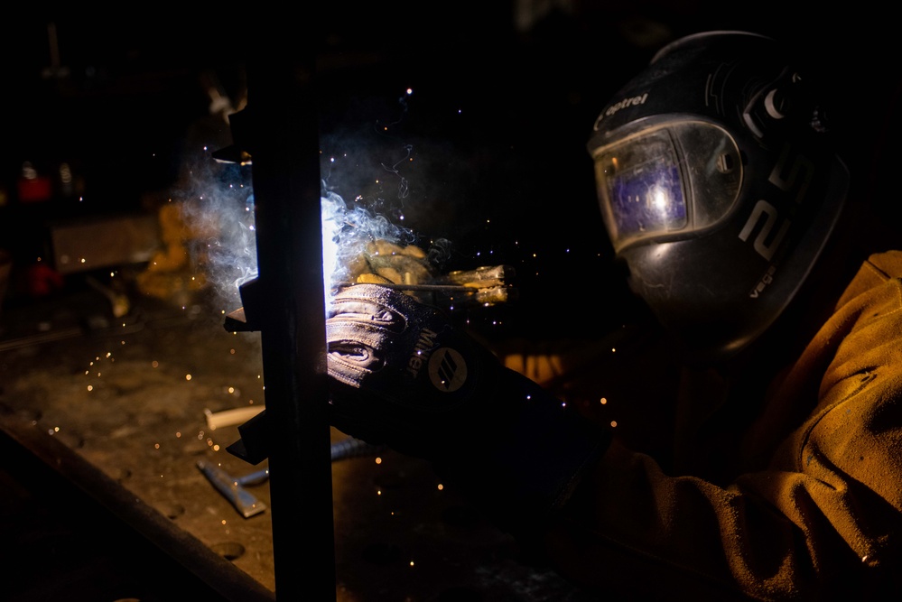 USS Ronald Reagan (CVN 76) Sailors practice welding