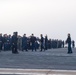 USS Ronald Reagan (CVN 76) Sailors and U.S. Army Soldiers participate in a FOD walk down