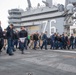USS Ronald Reagan (CVN 76) Sailors and U.S. Army Soldiers participate in a FOD walk down