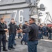 USS Ronald Reagan (CVN 76) Sailors and U.S. Army Soldiers participate in a FOD walk down