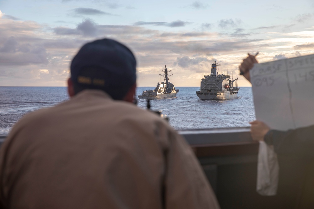 USS Spruance and USS Michael Murphy conduct replenishment-at-sea with USNS Henry J. Kaiser