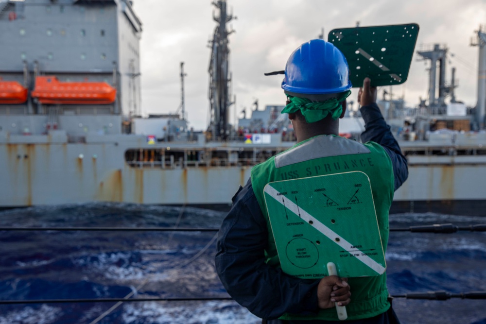 USS Spruance and USS Michael Murphy conduct replenishment-at-sea with USNS Henry J. Kaiser