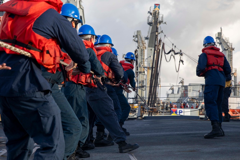 USS Spruance and USS Michael Murphy conduct replenishment-at-sea with USNS Henry J. Kaiser