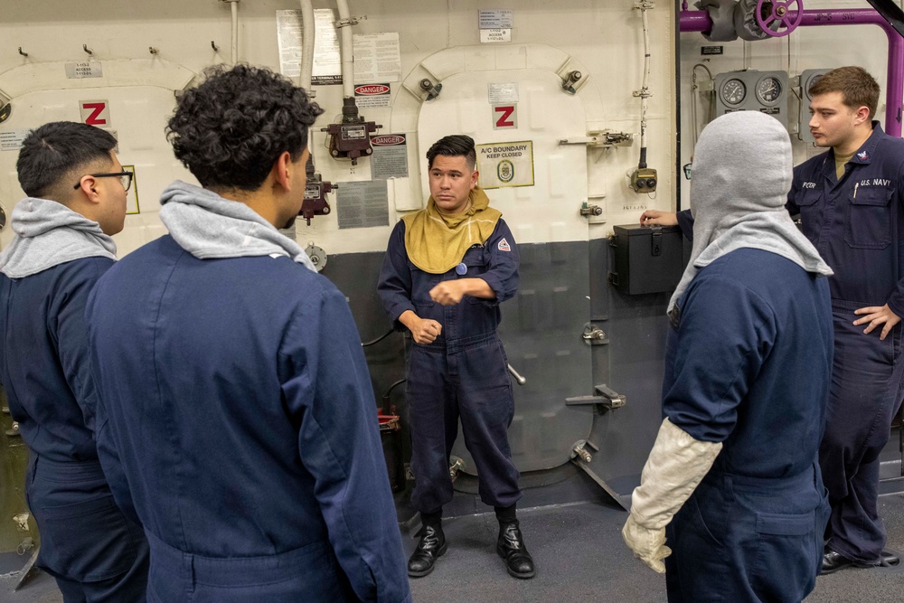 Sailors Conduct a General Quarters Drill