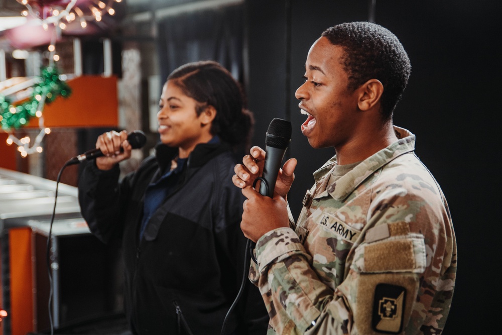 USS Ronald Reagan (CVN 76) Sailors participate in karaoke