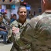 Chief Warrant Officer 5 Tracy Dooley passes the saber