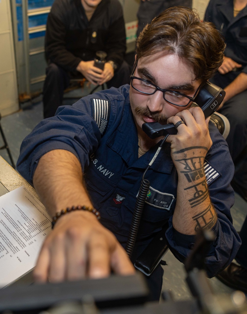 FC2 Joseph Ard Communicates With Tactical Action Officer