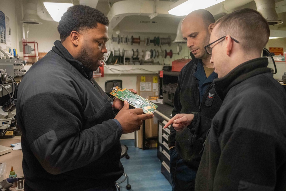 USS Ronald Reagan (CVN 76) Sailors conduct soldering training