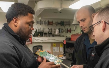 USS Ronald Reagan (CVN 76) Sailors conduct soldering training