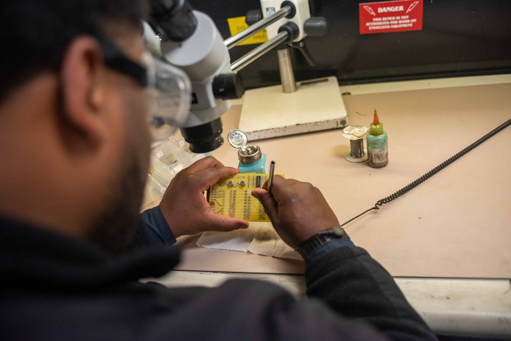 USS Ronald Reagan (CVN 76) Sailors conduct soldering training