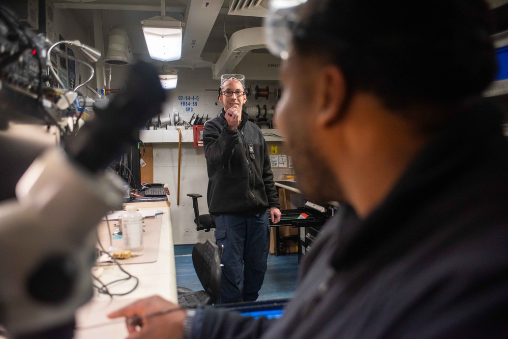 USS Ronald Reagan (CVN 76) Sailors conduct soldering training