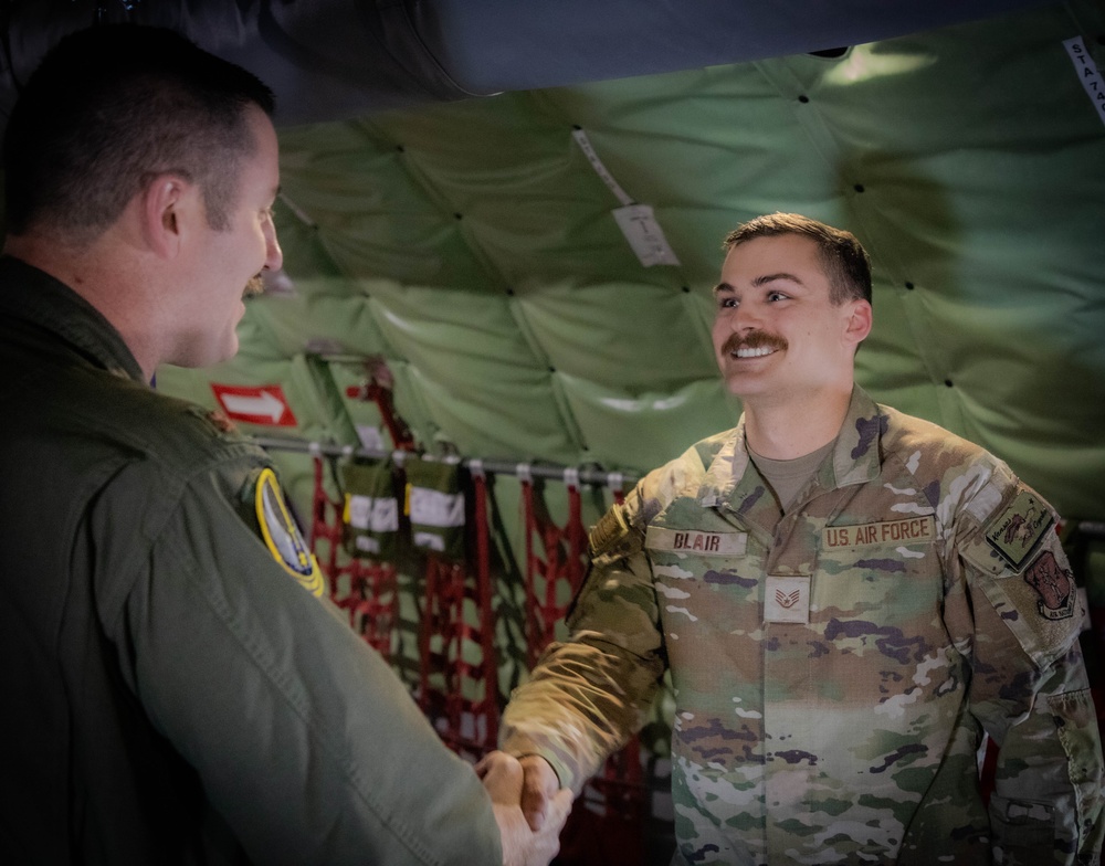 A Moment to Remember: 190th Crew Chiefs Rally for Inflight Reenlistment Ceremony