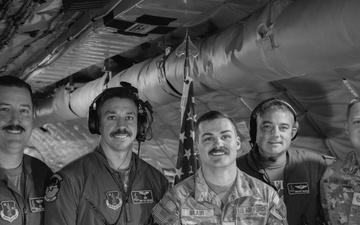 A Moment to Remember: 190th Crew Chiefs Rally for Inflight Reenlistment Ceremony