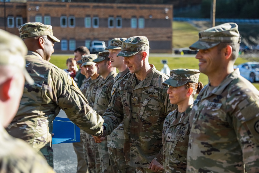 West National Guard Members are Awarded the Norwegian Foot March Badge