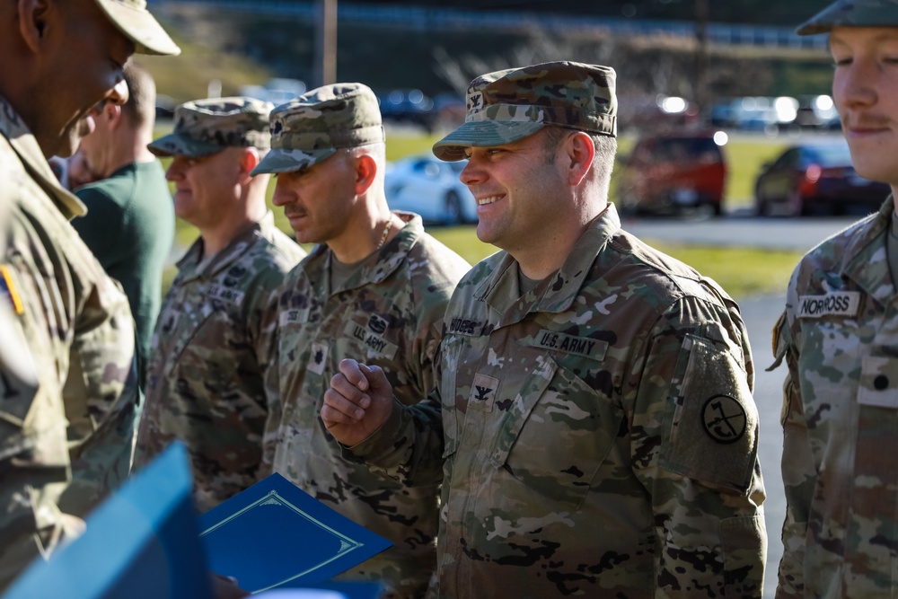 West National Guard Members are Awarded the Norwegian Foot March Badge