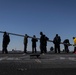 USS Gerald R. Ford (CVN 78) Sailors shift colors while underway